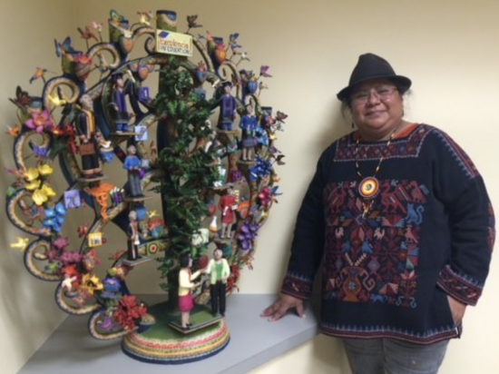 Artist Veronica Castillo with Excelencia Tree of Life